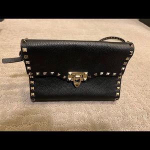 Valentino Small size rock stud grainy calfskin crossbody bag.